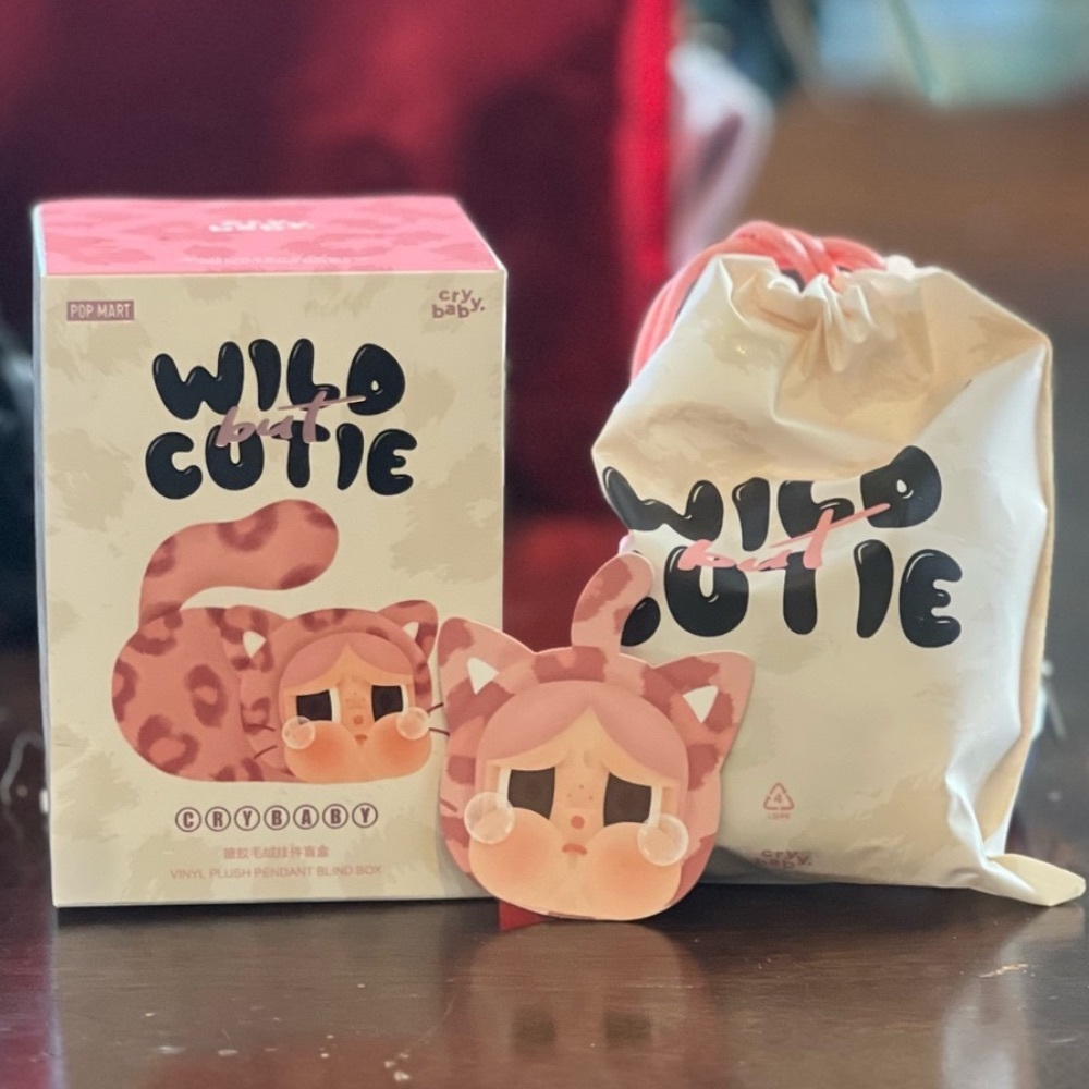 Crybaby Cute but Wild vinyl pendant.